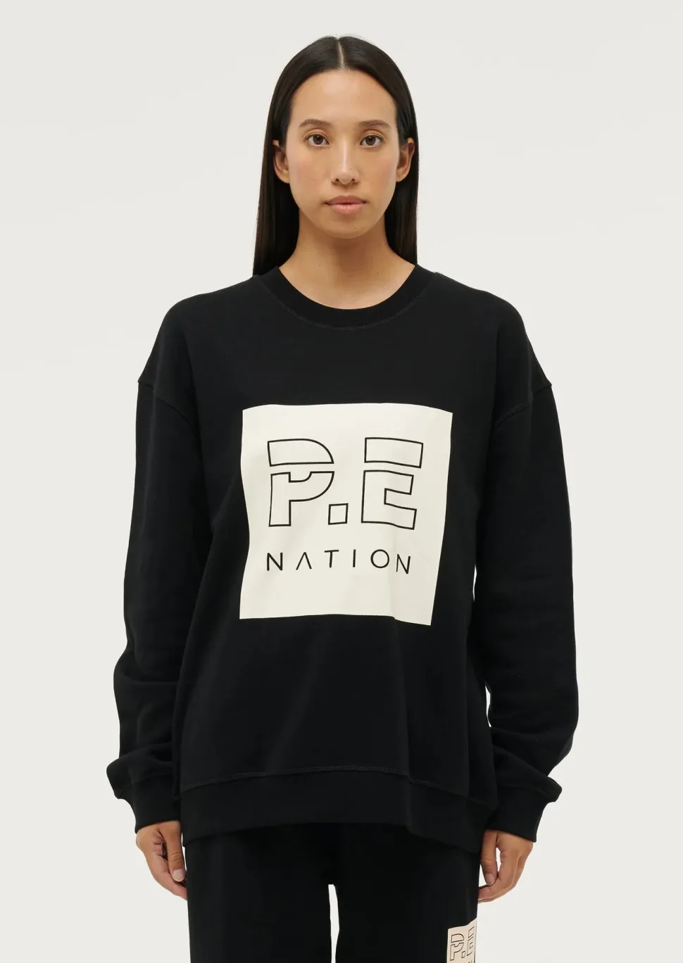 pe_nation_cut_shot_sweat__black_3.webp P.E NATION 'Cut Shot Sweat' - Black Clearance